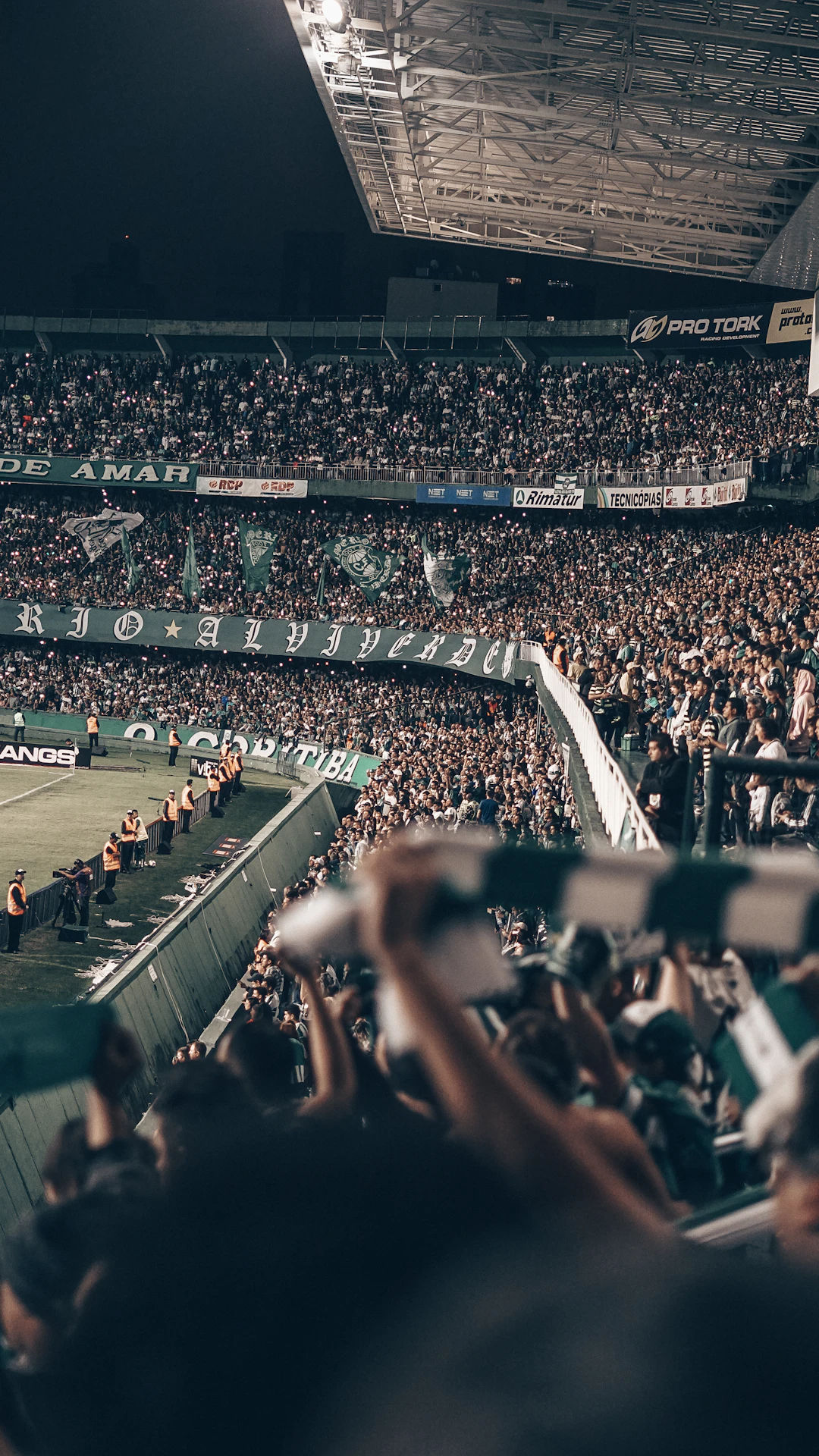 people in stadium at night
