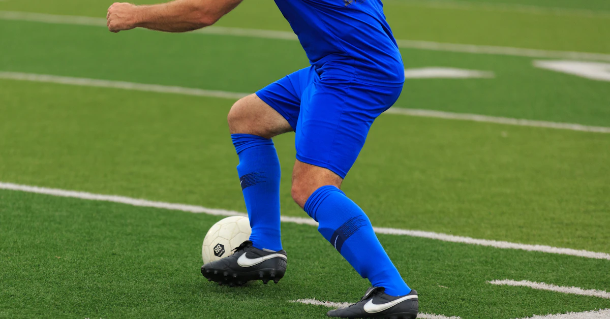 person in blue and white nike soccer jersey